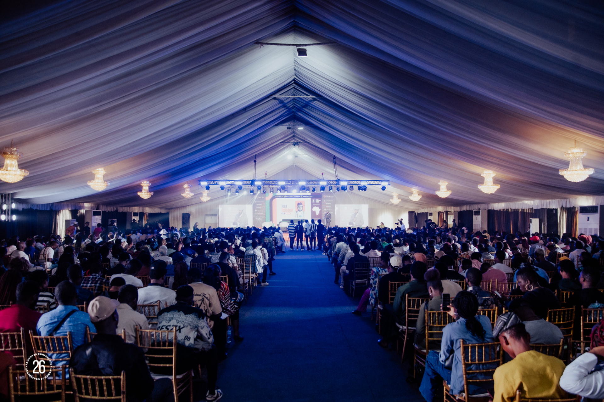 The packed audience tent at the Launch26 Conference